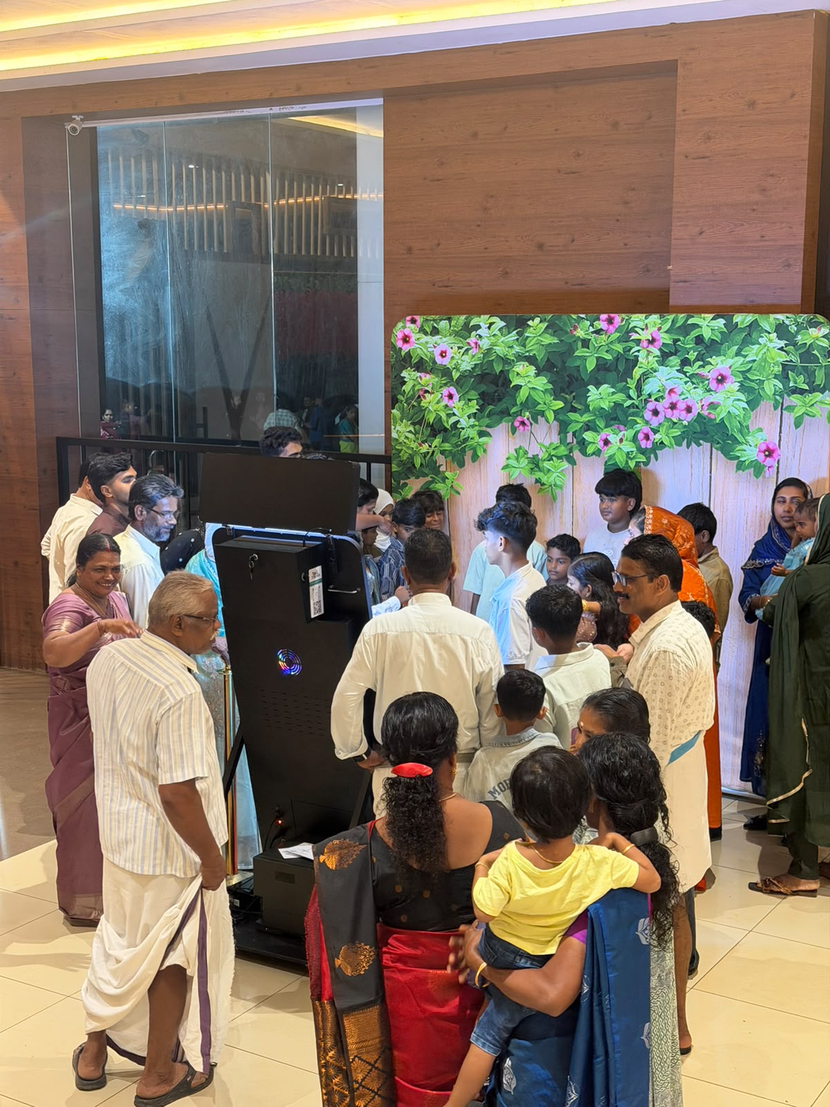 Guests gathered around the PartyBooth photobooth at Sabarmathy Convention Centre, Nilambur